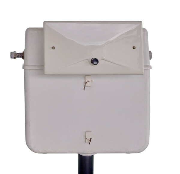 The first concealed cistern - The first Geberit concealed cistern (UP 15.000) and the first Geberit actuator plate from 1964.